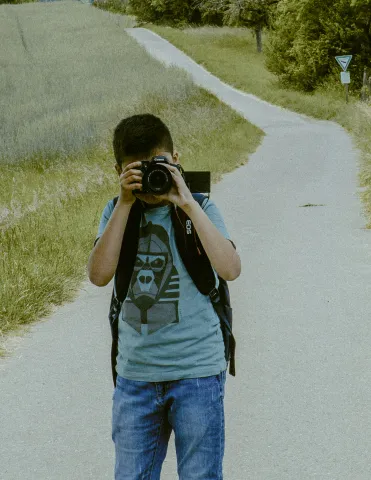 Boy taking picture 