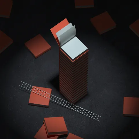 stacked books with ladder 