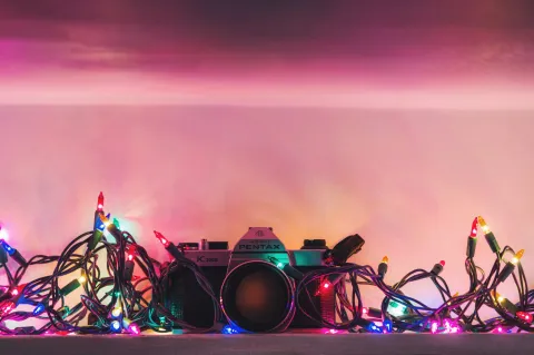 camera with colorful holiday lights. 