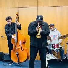 3 members of the Phil Hale Jazz Quartet performing