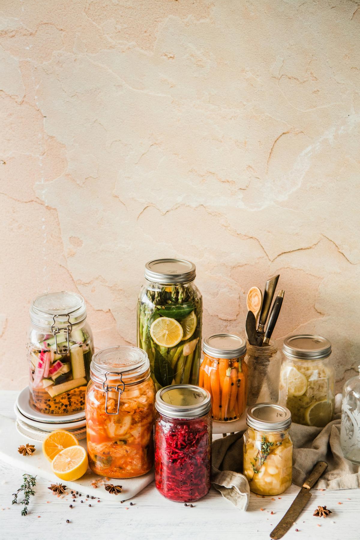 jars containing colorful food.