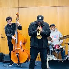 3 members of the Phil Hale Jazz Quartet performing